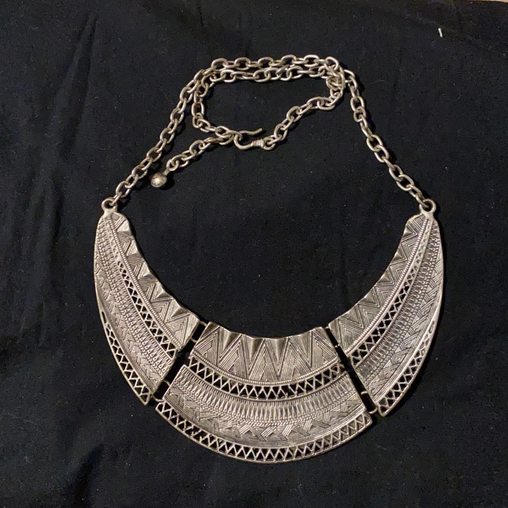 Silver colored statement necklace